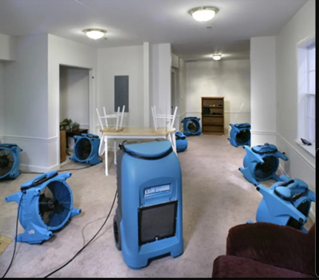 Air movers and dehumidifier setup for Water Damage Restoration in Ridgewood village
